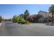 Quiet community street showcases lush landscaping and well-maintained homes for a peaceful environment at 8768 Tom Noon Ave # 101, Las Vegas, NV 89178