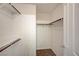 Walk-in closet with ample shelving and hanging rods for organized storage solutions at 8768 Tom Noon Ave # 101, Las Vegas, NV 89178