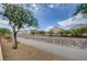 A scenic walking path lined with trees and landscaping offers a peaceful and enjoyable experience for residents at 8768 Tom Noon Ave # 101, Las Vegas, NV 89178