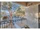 Relaxing balcony offering views of the courtyard and well-maintained greenery at 9050 Warm Springs Rd # 2050, Las Vegas, NV 89148