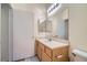 Cozy bathroom featuring a sink with vanity, framed mirror, and toilet at 9050 Warm Springs Rd # 2050, Las Vegas, NV 89148