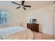 Comfortable bedroom with neutral walls and a ceiling fan at 9050 Warm Springs Rd # 2050, Las Vegas, NV 89148