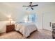 Cozy bedroom featuring a ceiling fan, neutral walls, and a comfortable bed at 9050 Warm Springs Rd # 2050, Las Vegas, NV 89148