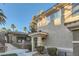 Exterior angle of the building showcasing stucco walls, manicured landscaping and well-kept shrubbery at 9050 Warm Springs Rd # 2050, Las Vegas, NV 89148