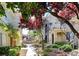 Beautiful exterior shot showcasing the building's architecture surrounded by manicured landscaping at 9050 Warm Springs Rd # 2050, Las Vegas, NV 89148