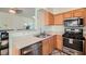 Modern kitchen with stainless steel appliances and ample counter space at 9050 Warm Springs Rd # 2050, Las Vegas, NV 89148