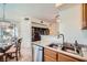 Cozy eat-in kitchen with stainless appliances that opens to the living area at 9050 Warm Springs Rd # 2050, Las Vegas, NV 89148