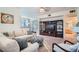 A bright living room featuring plush seating and modern entertainment center at 9050 Warm Springs Rd # 2050, Las Vegas, NV 89148