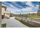 Private backyard with an iron fence and golf course view, offering a serene outdoor space at 916 Pro Players Dr, Las Vegas, NV 89134