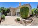 Well-maintained backyard with a concrete patio and mature landscaping, perfect for outdoor entertaining at 916 Pro Players Dr, Las Vegas, NV 89134