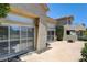 Rear view of the property with sliding doors opening to a spacious patio area at 916 Pro Players Dr, Las Vegas, NV 89134