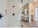 Bright bathroom featuring a glass shower with white tile and black hardware at 916 Pro Players Dr, Las Vegas, NV 89134