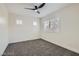 Bright bedroom with white walls, shuttered windows, and ceiling fan at 916 Pro Players Dr, Las Vegas, NV 89134