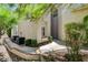 Side exterior view of home featuring manicured landscaping and walkway at 916 Pro Players Dr, Las Vegas, NV 89134