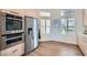 Modern kitchen with stainless steel appliances and bright windows at 916 Pro Players Dr, Las Vegas, NV 89134