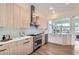 Stylish kitchen with stainless steel appliances and ample counter space at 916 Pro Players Dr, Las Vegas, NV 89134