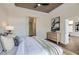 Comfortable main bedroom with a modern accent wall, slider door, and lots of natural light at 916 Pro Players Dr, Las Vegas, NV 89134