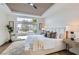 Serene primary bedroom featuring a sliding glass door and accent ceiling at 916 Pro Players Dr, Las Vegas, NV 89134