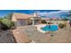 Lush backyard featuring a refreshing swimming pool and spacious patio area, perfect for outdoor relaxation at 9337 Quail Ridge Dr, Las Vegas, NV 89134