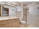 Bright bathroom with a shower, vanity, and toilet at 9337 Quail Ridge Dr, Las Vegas, NV 89134