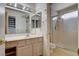 Bright bathroom with a shower, vanity, and toilet at 9337 Quail Ridge Dr, Las Vegas, NV 89134