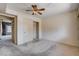 Bedroom featuring a ceiling fan, closet, and wall-to-wall carpeting at 9337 Quail Ridge Dr, Las Vegas, NV 89134