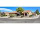 Charming one-story home with desert landscaping, tile roofing, and a two-car garage at 9337 Quail Ridge Dr, Las Vegas, NV 89134