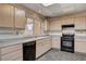 Kitchen with sleek countertops and a stainless steel sink and dishwasher at 9337 Quail Ridge Dr, Las Vegas, NV 89134