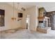 View of living room with fireplace and access to kitchen at 9337 Quail Ridge Dr, Las Vegas, NV 89134
