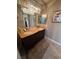 Bathroom with decorative lighting and a double sink vanity at 9816 Villa Ridge Dr, Las Vegas, NV 89134