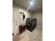 Cozy laundry room with modern washer and dryer and neutral tile flooring at 9816 Villa Ridge Dr, Las Vegas, NV 89134