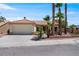 Charming single-story home with well-maintained landscaping and a two-car garage at 11009 Summers End Ave, Las Vegas, NV 89134