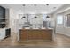 Beautiful kitchen with stainless-steel appliances, a central island, and an open layout perfect for entertaining at 11009 Summers End Ave, Las Vegas, NV 89134
