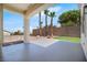 Covered patio features a minimalistic design with desert landscaping for relaxed outdoor living at 11009 Summers End Ave, Las Vegas, NV 89134