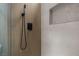 Contemporary shower design featuring upscale showerhead, a built-in niche and modern tiling at 11009 Summers End Ave, Las Vegas, NV 89134