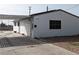 Charming home featuring a covered parking area and a well-maintained front exterior with a white facade at 1220 Toledo St, Henderson, NV 89015