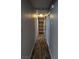 Hallway showcases wood-look floors and storage closet at 1220 Toledo St, Henderson, NV 89015