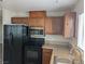 Functional kitchen boasts modern appliances, ample counter space, and stylish cabinets for efficient living at 1220 Toledo St, Henderson, NV 89015