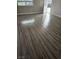 Living room featuring wood-look floors, bright light and ample space at 1220 Toledo St, Henderson, NV 89015