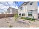 Large backyard with desert landscaping and privacy fence at 1289 Miller Springs Ln # 96, North Las Vegas, NV 89084