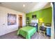 Stylish bedroom featuring desk, art, and closet space at 1289 Miller Springs Ln # 96, North Las Vegas, NV 89084