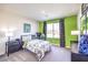 Bright bedroom with unique decor, offering a creative and comfortable living space at 1289 Miller Springs Ln # 96, North Las Vegas, NV 89084