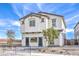 Stylish two-story residence with desert landscaping and a modern design aesthetic at 1289 Miller Springs Ln # 96, North Las Vegas, NV 89084