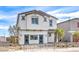 Attractive two-story home with a tiled roof and carefully manicured landscaping at 1289 Miller Springs Ln # 96, North Las Vegas, NV 89084