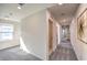 Upstairs hallway featuring carpet, recessed lighting, and access to several rooms at 1289 Miller Springs Ln # 96, North Las Vegas, NV 89084