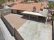 A beautiful backyard with concrete and stone features offers a serene outdoor living and entertainment space at 1613 Glenrosa Dr, North Las Vegas, NV 89031