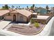 A beautiful single-story home with a well-kept yard, driveway, and tile roof at 1613 Glenrosa Dr, North Las Vegas, NV 89031