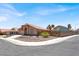 Well-maintained single-story home featuring desert landscaping, adding to its curb appeal at 1613 Glenrosa Dr, North Las Vegas, NV 89031