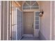 Close-up of the front door showcasing the unique security gate and entry details at 1613 Glenrosa Dr, North Las Vegas, NV 89031