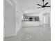 Open-concept living space flowing into a modern kitchen with updated appliances at 1613 Glenrosa Dr, North Las Vegas, NV 89031